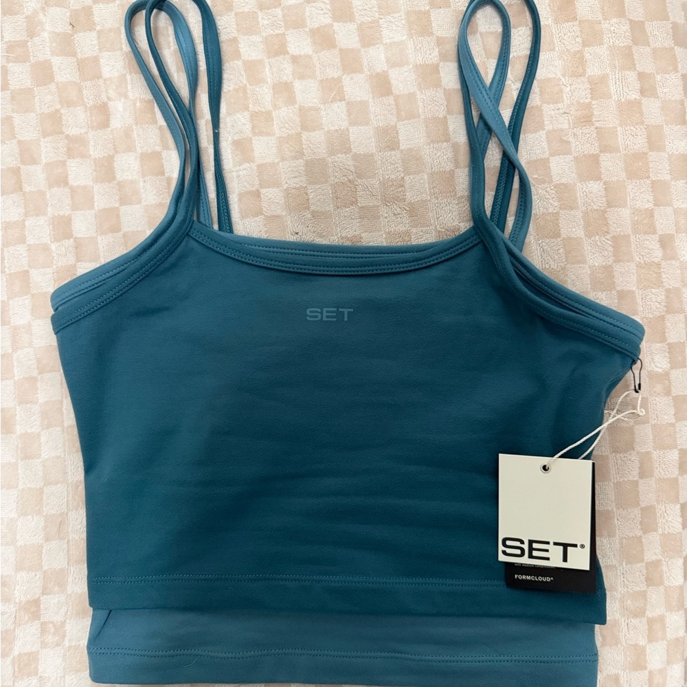 SET ACTIVE above the clouds tank